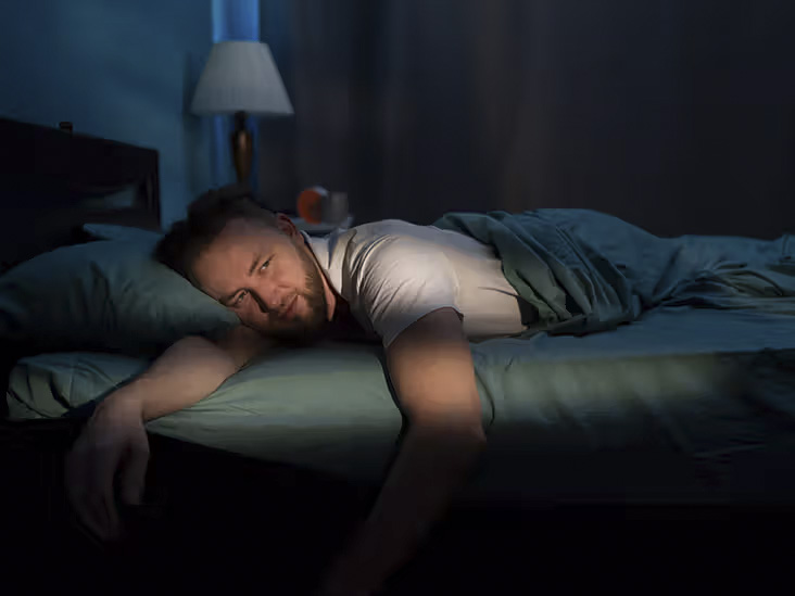sleepless-man-lying-in-bed-night-insomnia-732x549-thumbnail.jpg